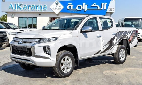 Acheter Import Voiture Mitsubishi L200 Blanc à Import - Dubai, Grande Comore Acheter Import Voiture Mitsubishi L200 Blanc à Import - Dubai, Grande Comore