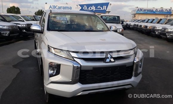 Acheter Import Voiture Mitsubishi L200 Blanc à Import - Dubai, Grande Comore Acheter Import Voiture Mitsubishi L200 Blanc à Import - Dubai, Grande Comore