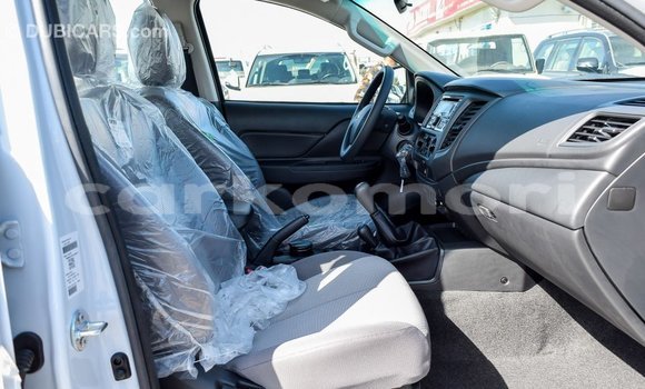 Acheter Import Voiture Mitsubishi L200 Blanc à Import - Dubai, Grande Comore Acheter Import Voiture Mitsubishi L200 Blanc à Import - Dubai, Grande Comore