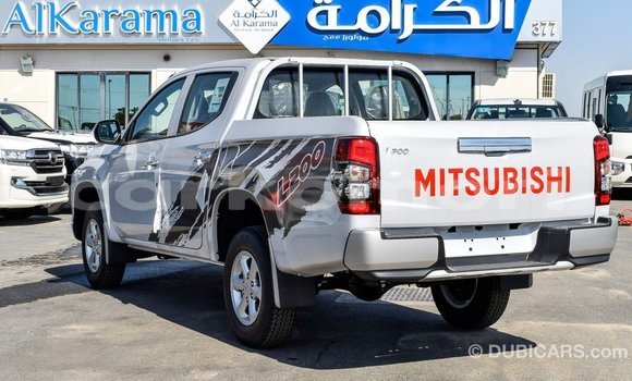 Acheter Import Voiture Mitsubishi L200 Blanc à Import - Dubai, Grande Comore Acheter Import Voiture Mitsubishi L200 Blanc à Import - Dubai, Grande Comore