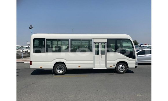 Acheter Import Voiture Toyota Coaster Blanc à Import - Dubai, Grande Comore Acheter Import Voiture Toyota Coaster Blanc à Import - Dubai, Grande Comore