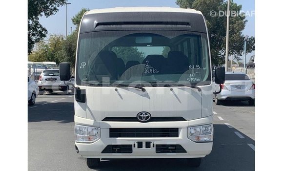 Acheter Import Voiture Toyota Coaster Blanc à Import - Dubai, Grande Comore Acheter Import Voiture Toyota Coaster Blanc à Import - Dubai, Grande Comore