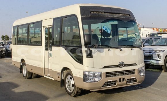 Acheter Import Voiture Toyota Coaster Blanc à Import - Dubai, Grande Comore Acheter Import Voiture Toyota Coaster Blanc à Import - Dubai, Grande Comore