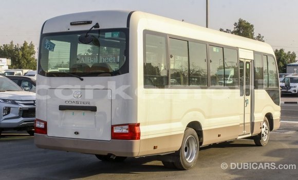 Acheter Import Voiture Toyota Coaster Blanc à Import - Dubai, Grande Comore Acheter Import Voiture Toyota Coaster Blanc à Import - Dubai, Grande Comore