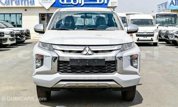 Acheter Import Voiture Mitsubishi L200 Blanc à Import - Dubai, Grande Comore Acheter Import Voiture Mitsubishi L200 Blanc à Import - Dubai, Grande Comore