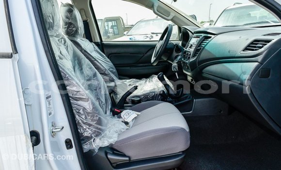 Acheter Import Voiture Mitsubishi L200 Blanc à Import - Dubai, Grande Comore Acheter Import Voiture Mitsubishi L200 Blanc à Import - Dubai, Grande Comore