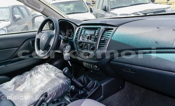 Acheter Import Voiture Mitsubishi L200 Blanc à Import - Dubai, Grande Comore Acheter Import Voiture Mitsubishi L200 Blanc à Import - Dubai, Grande Comore