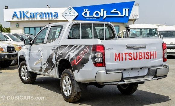 Acheter Import Voiture Mitsubishi L200 Blanc à Import - Dubai, Grande Comore Acheter Import Voiture Mitsubishi L200 Blanc à Import - Dubai, Grande Comore