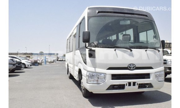 Acheter Import Voiture Toyota Coaster Blanc à Import - Dubai, Grande Comore Acheter Import Voiture Toyota Coaster Blanc à Import - Dubai, Grande Comore