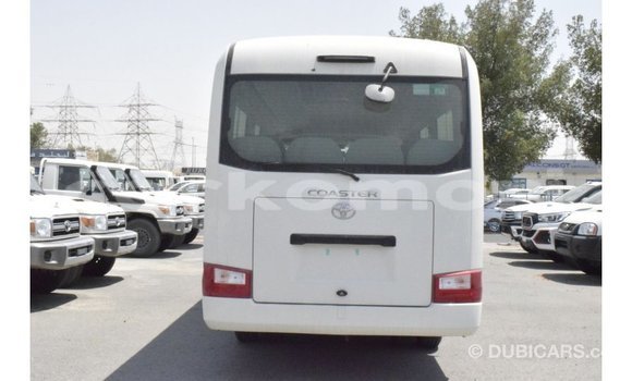 Acheter Import Voiture Toyota Coaster Blanc à Import - Dubai, Grande Comore Acheter Import Voiture Toyota Coaster Blanc à Import - Dubai, Grande Comore