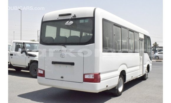 Acheter Import Voiture Toyota Coaster Blanc à Import - Dubai, Grande Comore Acheter Import Voiture Toyota Coaster Blanc à Import - Dubai, Grande Comore