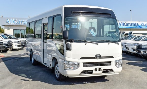 Acheter Import Voiture Toyota Coaster Blanc à Import - Dubai, Grande Comore Acheter Import Voiture Toyota Coaster Blanc à Import - Dubai, Grande Comore