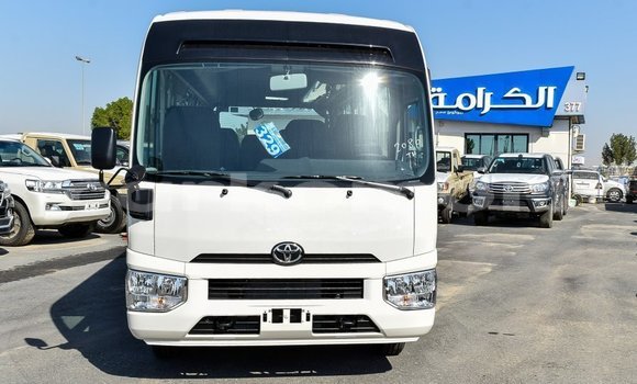 Acheter Import Voiture Toyota Coaster Blanc à Import - Dubai, Grande Comore Acheter Import Voiture Toyota Coaster Blanc à Import - Dubai, Grande Comore