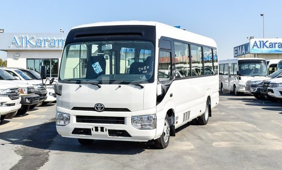 Acheter Import Voiture Toyota Coaster Blanc à Import - Dubai, Grande Comore Acheter Import Voiture Toyota Coaster Blanc à Import - Dubai, Grande Comore