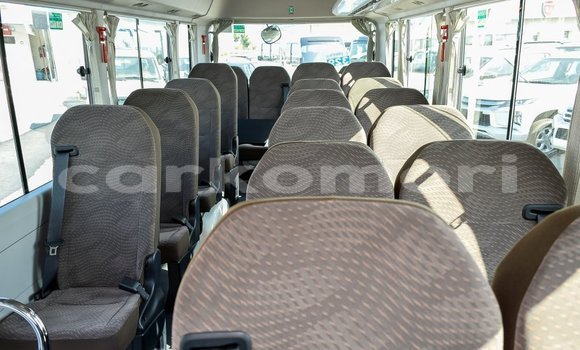 Acheter Import Voiture Toyota Coaster Blanc à Import - Dubai, Grande Comore Acheter Import Voiture Toyota Coaster Blanc à Import - Dubai, Grande Comore