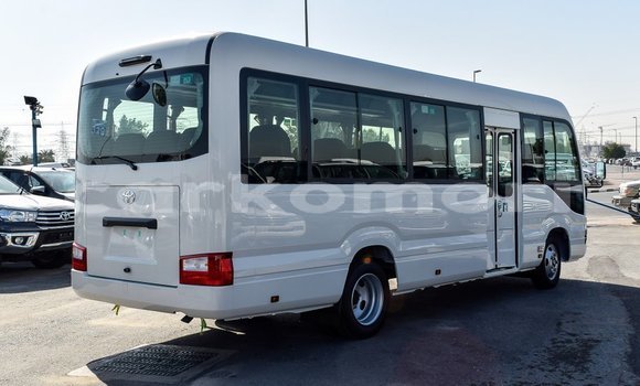 Acheter Import Voiture Toyota Coaster Blanc à Import - Dubai, Grande Comore Acheter Import Voiture Toyota Coaster Blanc à Import - Dubai, Grande Comore