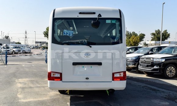 Acheter Import Voiture Toyota Coaster Blanc à Import - Dubai, Grande Comore Acheter Import Voiture Toyota Coaster Blanc à Import - Dubai, Grande Comore