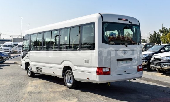 Acheter Import Voiture Toyota Coaster Blanc à Import - Dubai, Grande Comore Acheter Import Voiture Toyota Coaster Blanc à Import - Dubai, Grande Comore