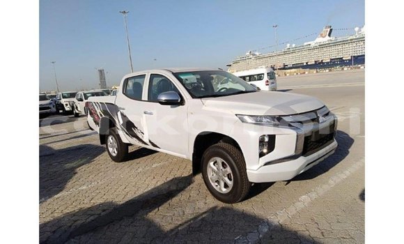 Buy Import Mitsubishi L200 White Car in Import - Dubai in Great Comore Buy Import Mitsubishi L200 White Car in Import - Dubai in Great Comore