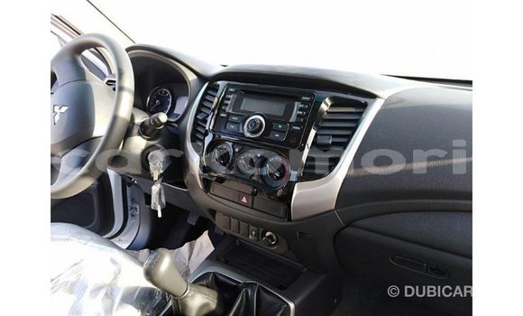 Buy Import Mitsubishi L200 White Car in Import - Dubai in Great Comore Buy Import Mitsubishi L200 White Car in Import - Dubai in Great Comore