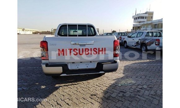 Buy Import Mitsubishi L200 White Car in Import - Dubai in Great Comore Buy Import Mitsubishi L200 White Car in Import - Dubai in Great Comore