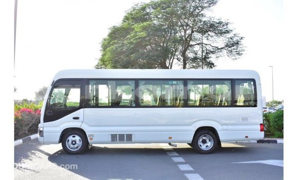 Buy Import Toyota Coaster White Car in Import - Dubai in Great Comore Buy Import Toyota Coaster White Car in Import - Dubai in Great Comore