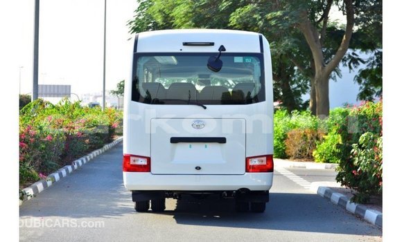 Buy Import Toyota Coaster White Car in Import - Dubai in Great Comore Buy Import Toyota Coaster White Car in Import - Dubai in Great Comore