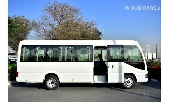 Buy Import Toyota Coaster White Car in Import - Dubai in Great Comore Buy Import Toyota Coaster White Car in Import - Dubai in Great Comore