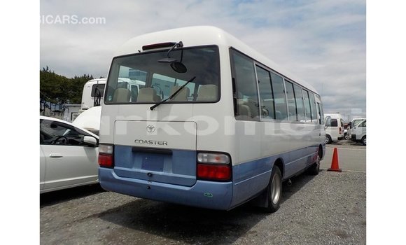 Acheter Import Voiture Toyota Coaster Blanc à Import - Dubai, Grande Comore Acheter Import Voiture Toyota Coaster Blanc à Import - Dubai, Grande Comore