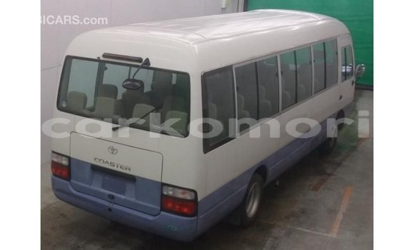 Acheter Import Voiture Toyota Coaster Blanc à Import - Dubai, Grande Comore Acheter Import Voiture Toyota Coaster Blanc à Import - Dubai, Grande Comore
