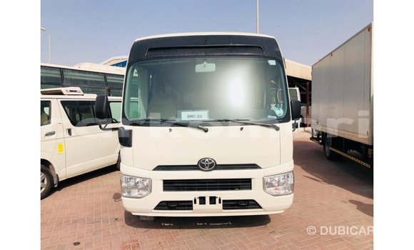 Acheter Import Voiture Toyota Coaster Blanc à Import - Dubai, Grande Comore Acheter Import Voiture Toyota Coaster Blanc à Import - Dubai, Grande Comore