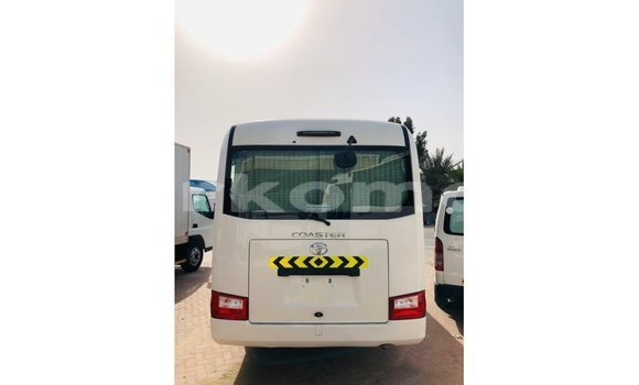 Acheter Import Voiture Toyota Coaster Blanc à Import - Dubai, Grande Comore Acheter Import Voiture Toyota Coaster Blanc à Import - Dubai, Grande Comore
