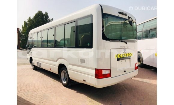 Acheter Import Voiture Toyota Coaster Blanc à Import - Dubai, Grande Comore Acheter Import Voiture Toyota Coaster Blanc à Import - Dubai, Grande Comore