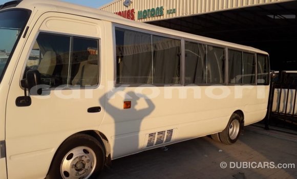 Acheter Import Voiture Toyota Coaster Blanc à Import - Dubai, Grande Comore Acheter Import Voiture Toyota Coaster Blanc à Import - Dubai, Grande Comore