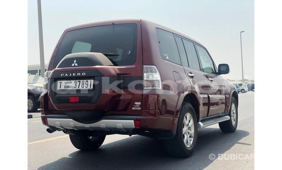 Acheter Import Voiture Mitsubishi Pajero Rouge à Import - Dubai, Grande Comore Acheter Import Voiture Mitsubishi Pajero Rouge à Import - Dubai, Grande Comore