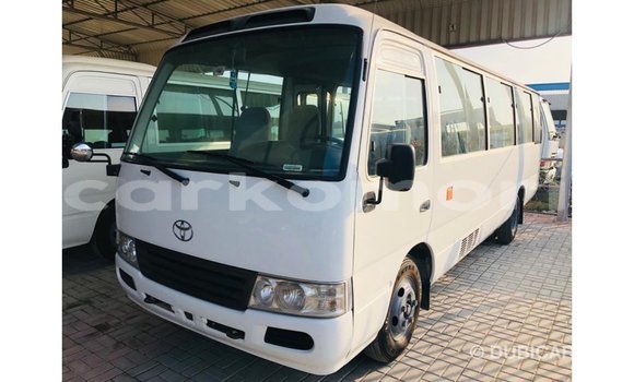 Acheter Import Voiture Toyota Coaster Blanc à Import - Dubai, Grande Comore Acheter Import Voiture Toyota Coaster Blanc à Import - Dubai, Grande Comore