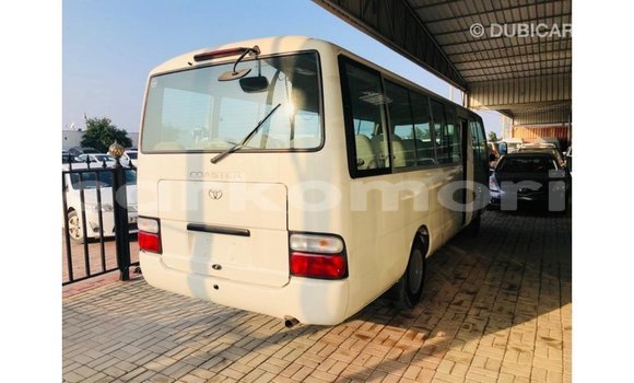 Acheter Import Voiture Toyota Coaster Blanc à Import - Dubai, Grande Comore Acheter Import Voiture Toyota Coaster Blanc à Import - Dubai, Grande Comore