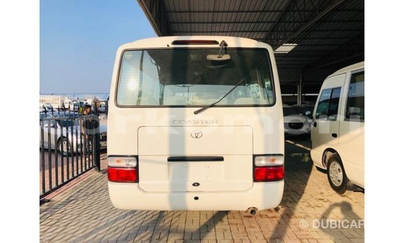 Acheter Import Voiture Toyota Coaster Blanc à Import - Dubai, Grande Comore Acheter Import Voiture Toyota Coaster Blanc à Import - Dubai, Grande Comore
