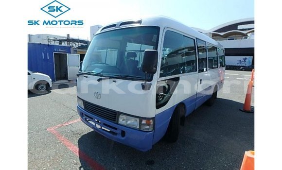 Acheter Import Voiture Toyota Coaster Blanc à Import - Dubai, Grande Comore