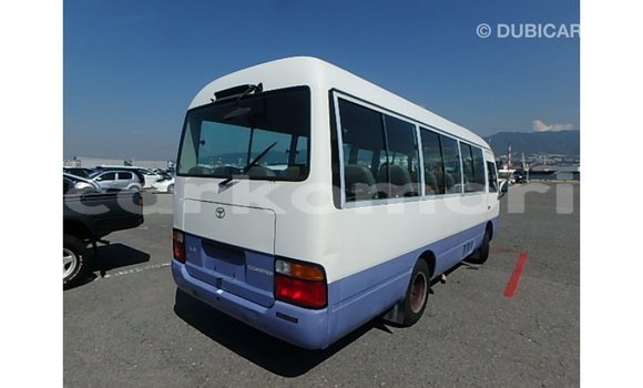 Acheter Import Voiture Toyota Coaster Blanc à Import - Dubai, Grande Comore Acheter Import Voiture Toyota Coaster Blanc à Import - Dubai, Grande Comore
