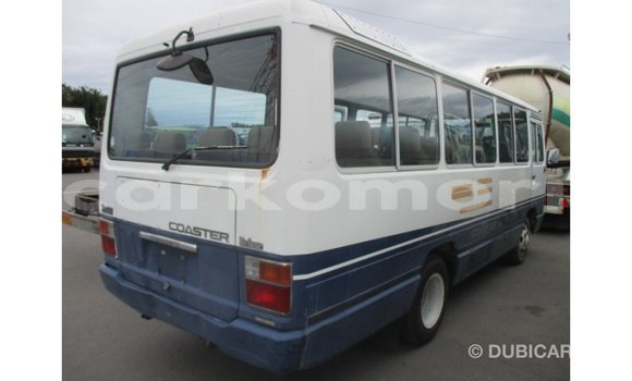Acheter Import Voiture Toyota Coaster Blanc à Import - Dubai, Grande Comore Acheter Import Voiture Toyota Coaster Blanc à Import - Dubai, Grande Comore