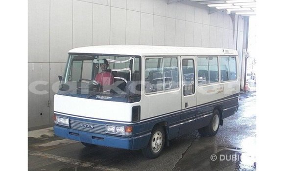 Acheter Import Voiture Toyota Coaster Blanc à Import - Dubai, Grande Comore Acheter Import Voiture Toyota Coaster Blanc à Import - Dubai, Grande Comore