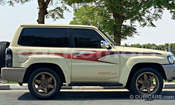 Buy Import Nissan Patrol Beige Car in Import - Dubai in Great Comore Buy Import Nissan Patrol Beige Car in Import - Dubai in Great Comore