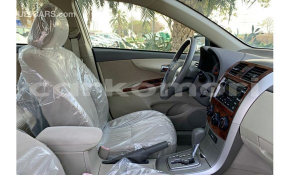 Buy Import Toyota Corolla White Car in Import - Dubai in Great Comore Buy Import Toyota Corolla White Car in Import - Dubai in Great Comore