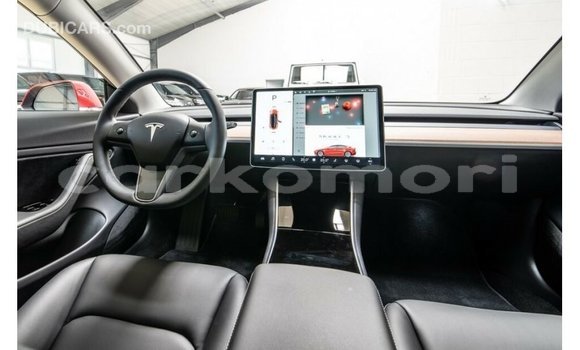 Buy Import Tesla Model 3 Red Car in Import - Dubai in Great Comore Buy Import Tesla Model 3 Red Car in Import - Dubai in Great Comore