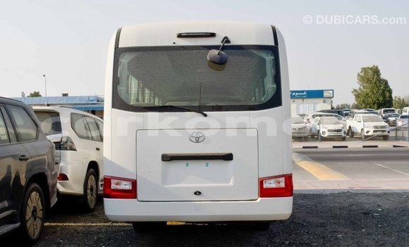 Buy Import Toyota Coaster White Car in Import - Dubai in Great Comore Buy Import Toyota Coaster White Car in Import - Dubai in Great Comore