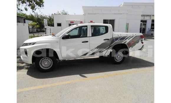 Buy Import Mitsubishi L200 White Car in Import - Dubai in Great Comore Buy Import Mitsubishi L200 White Car in Import - Dubai in Great Comore