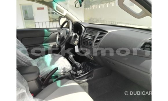 Buy Import Mitsubishi L200 White Car in Import - Dubai in Great Comore Buy Import Mitsubishi L200 White Car in Import - Dubai in Great Comore