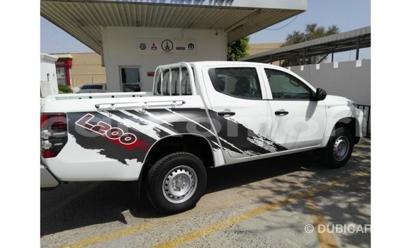 Buy Import Mitsubishi L200 White Car in Import - Dubai in Great Comore Buy Import Mitsubishi L200 White Car in Import - Dubai in Great Comore