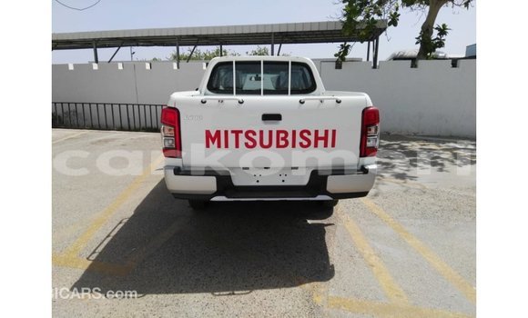 Buy Import Mitsubishi L200 White Car in Import - Dubai in Great Comore Buy Import Mitsubishi L200 White Car in Import - Dubai in Great Comore